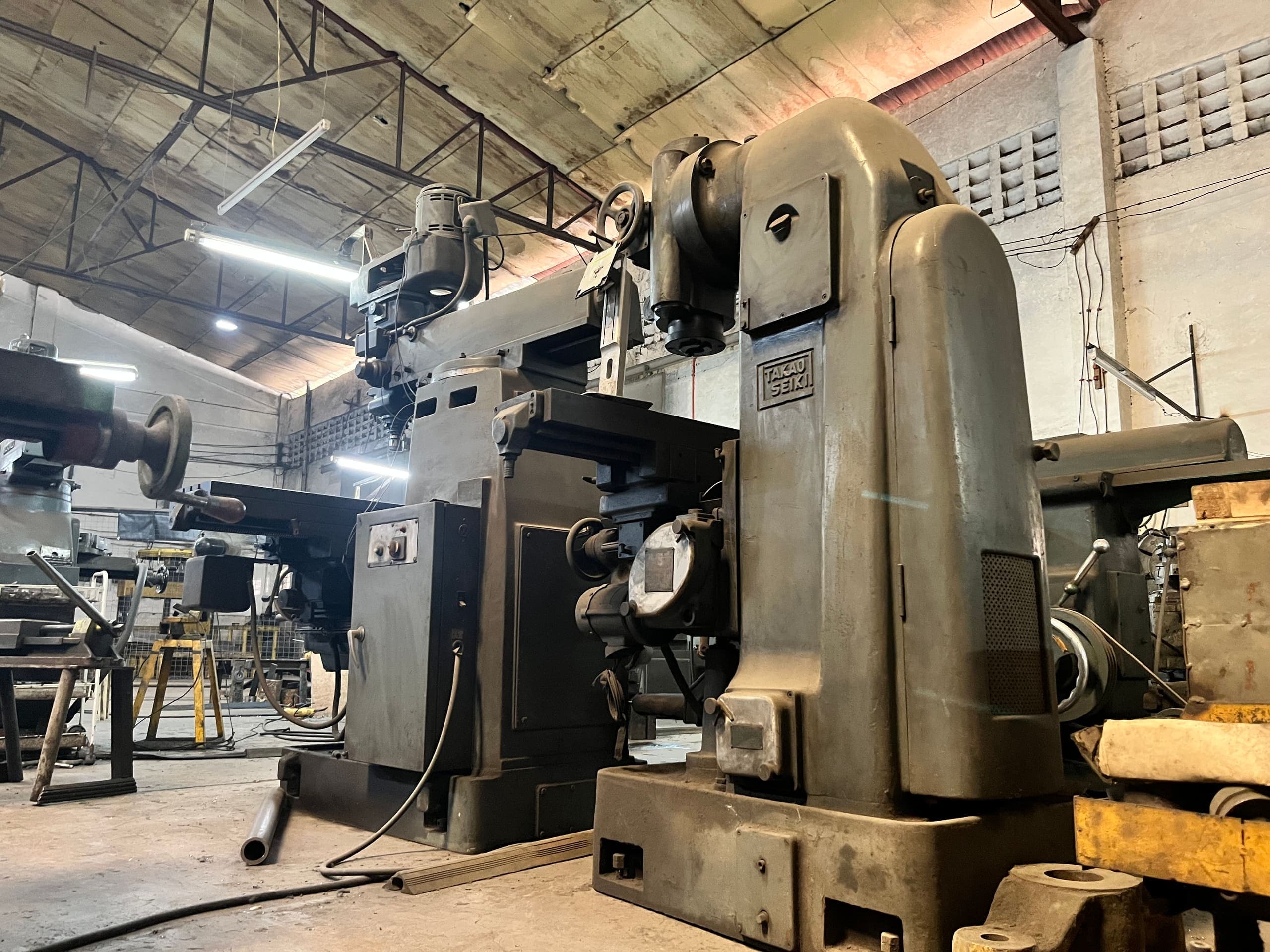 Takau Seiki industrial rubber machinery and precision manufacturing equipment