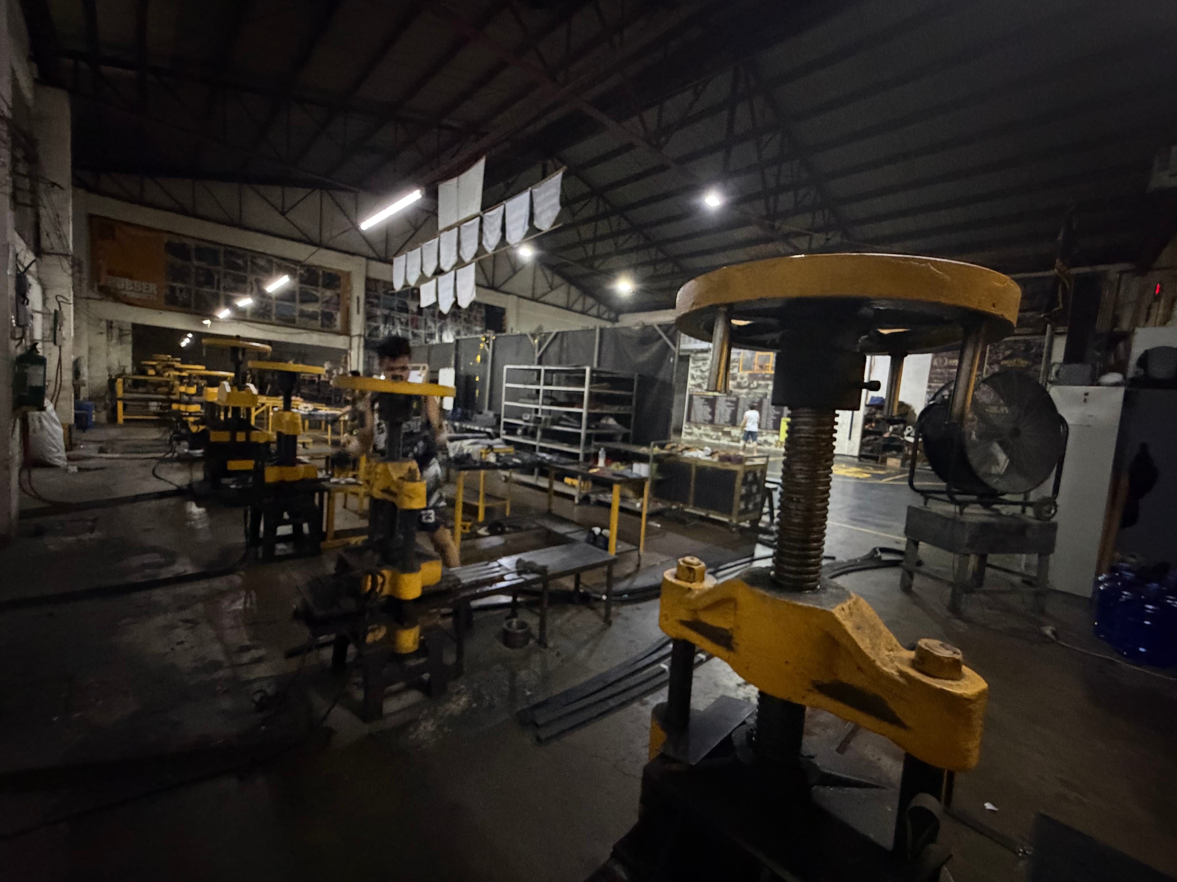RK Rubber industrial molding presses in the manufacturing facility